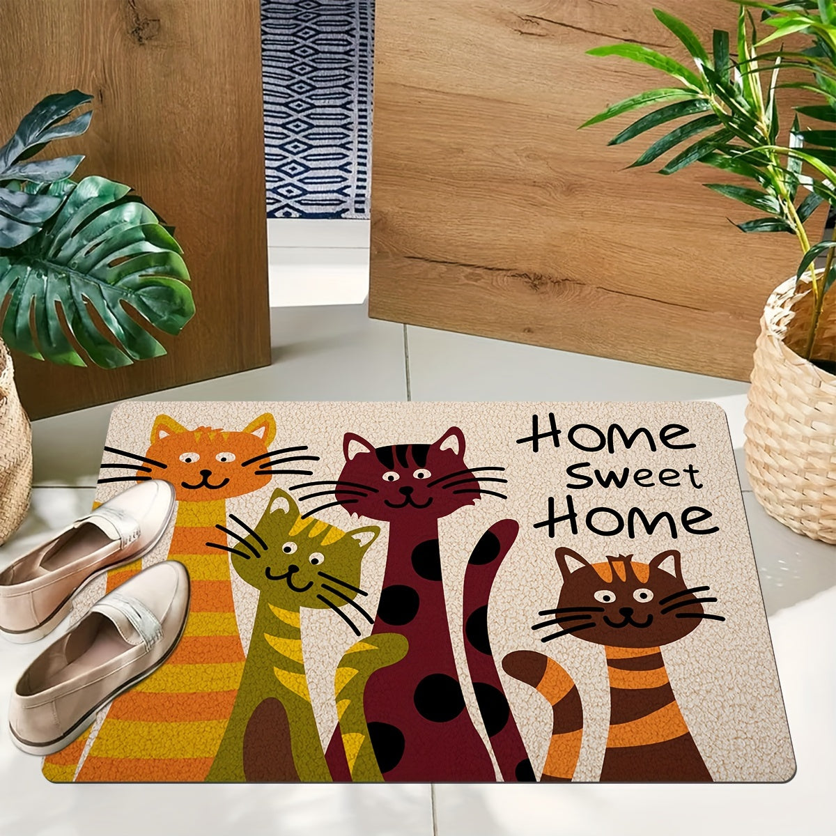 One piece of an entrance floor mat, featuring a giant cat homecoming alphabet print pattern. Made of polyester, this non-slip and stain-resistant floor mat is suitable for indoor and outdoor use as a doormat for the entrance.