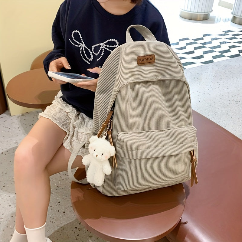 Large capacity women's corduroy backpack with cute bear pendant, ideal for high school and junior high.