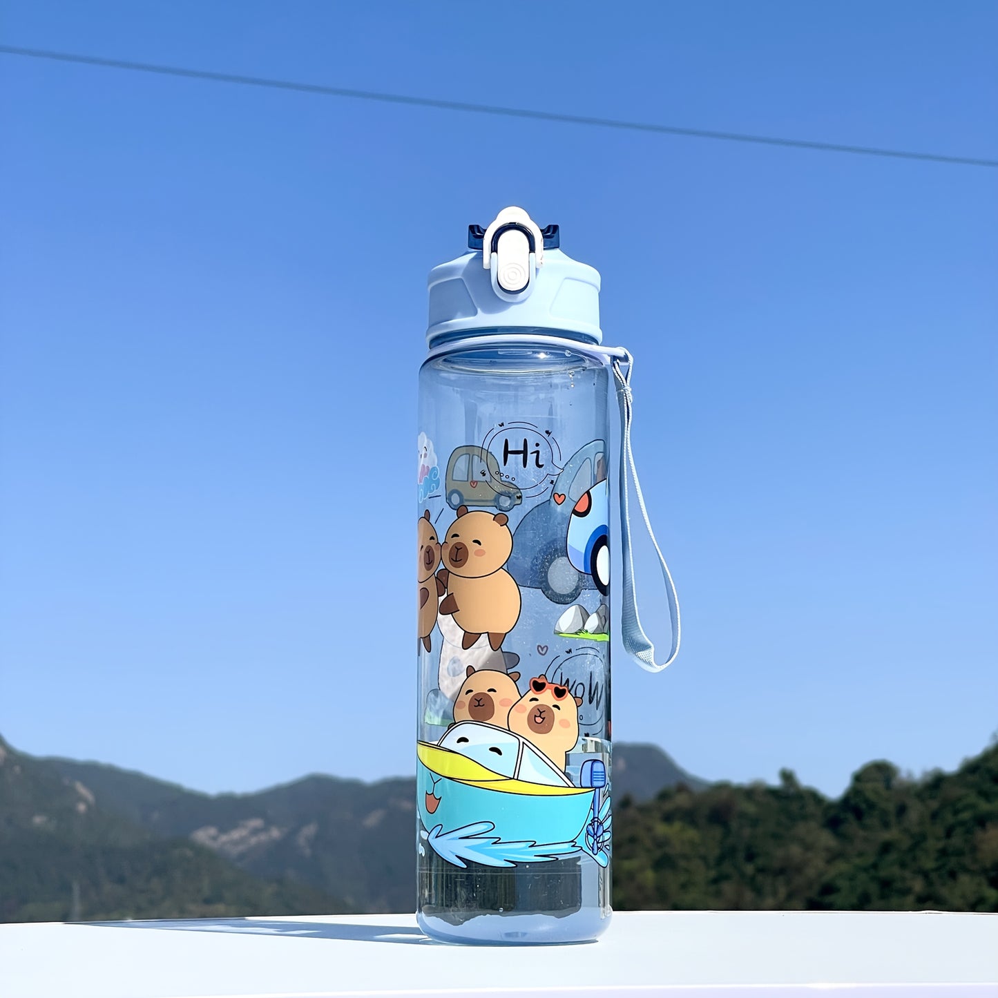 Adorable large sports water bottle with whimsical designs. Durable and portable, perfect for outdoor activities.