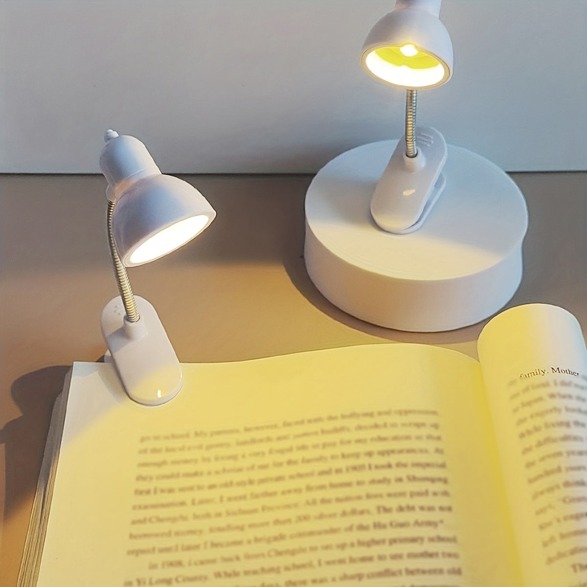 Mini clip-on reading lamp with push button control, adjustable arm, and fantasy-themed brushed finish made of plastic material. Battery operated for bedroom tabletop use as a night light.