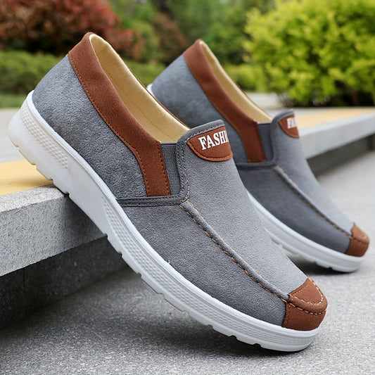 Men's slip-on casual sports sneakers with solid color, lightweight fabric upper, non-slip sole, and breathable insole for outdoor running and daily wear in spring and fall.