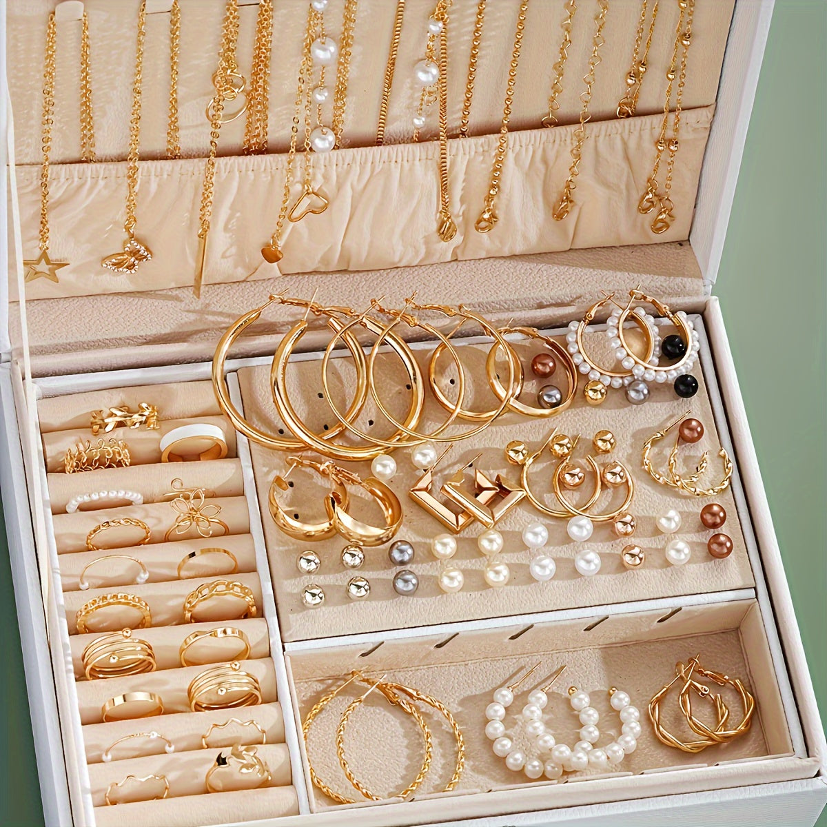 This Vintage Elegant Jewelry Set features 86 pieces of necklaces, earrings, rings, and earring backs. Perfect for both daily wear and special occasions, this set is suitable for all seasons and includes a variety of styles and materials. It makes a great