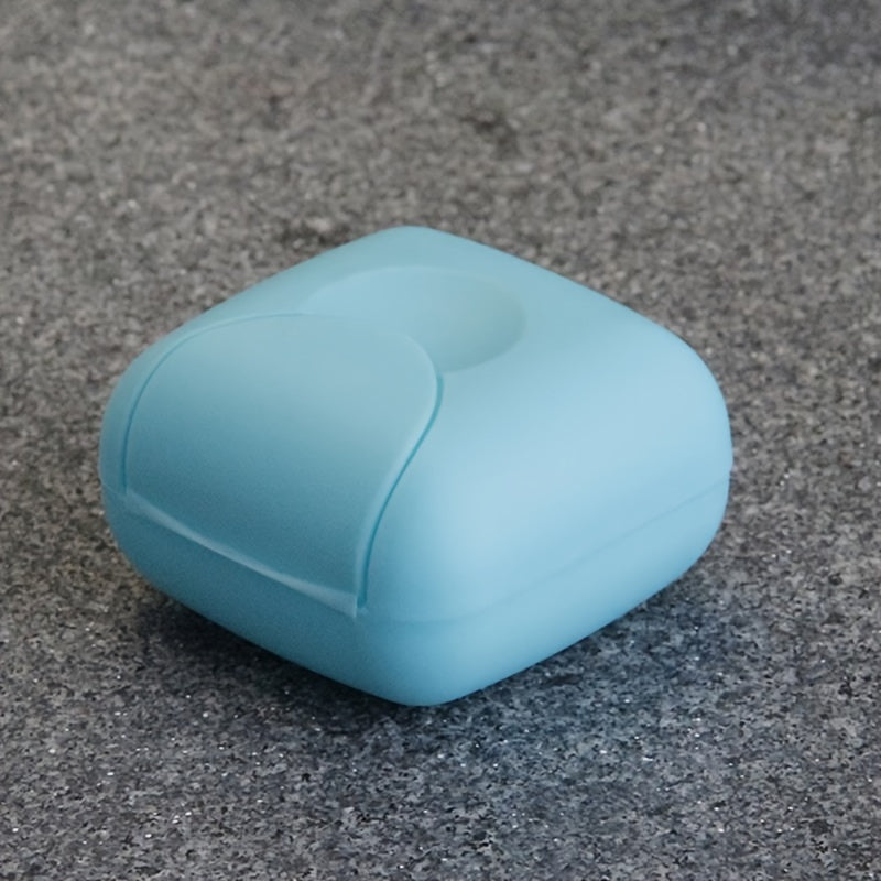 Plastic soap box with lid for travel, camping, or gym use. Waterproof and portable. Perfect for storing soap on the go.