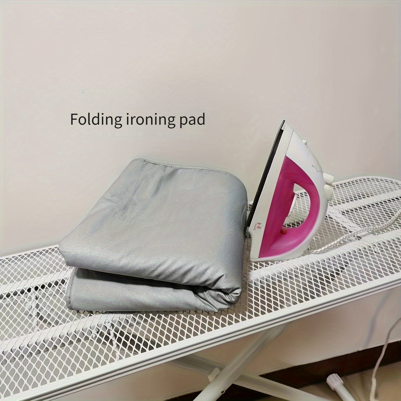 Ideal for electric ironing, this extra-large ironing pad features 3 layers of heat-resistant waterproof material with a non-slip lining. The thick titanium coated fabric ensures durability, and the pad can be easily folded for compact storage.