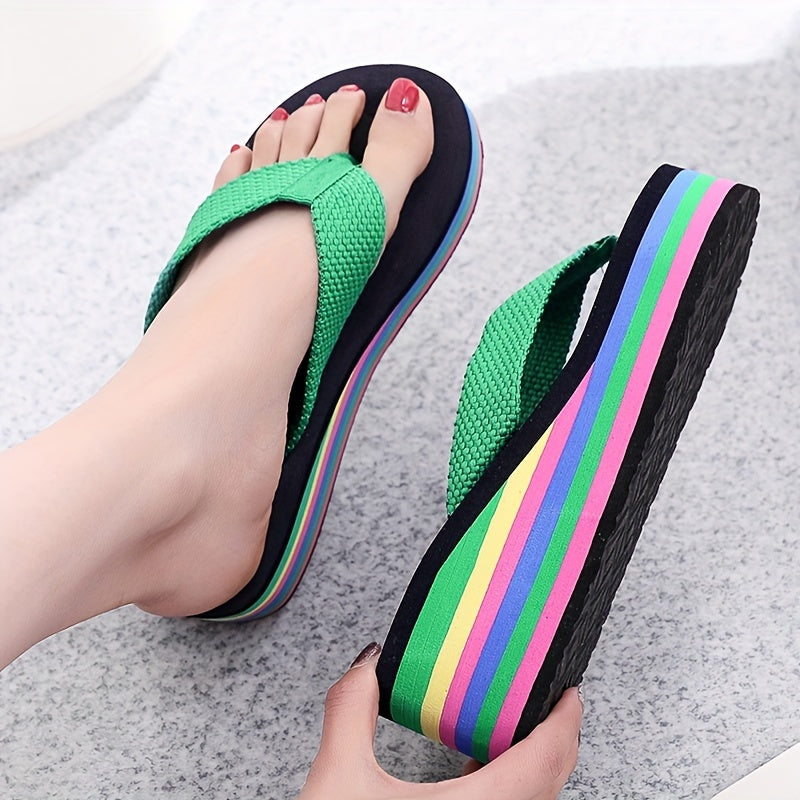 Summer clog flip flops with high heels and rainbow sole for seaside vacation.