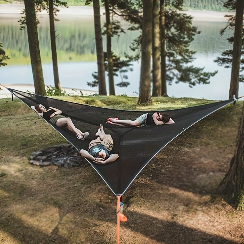 Large triangular hammock made of durable polyester fabric, easy to assemble with no power needed. Ideal for camping and outdoor relaxation.