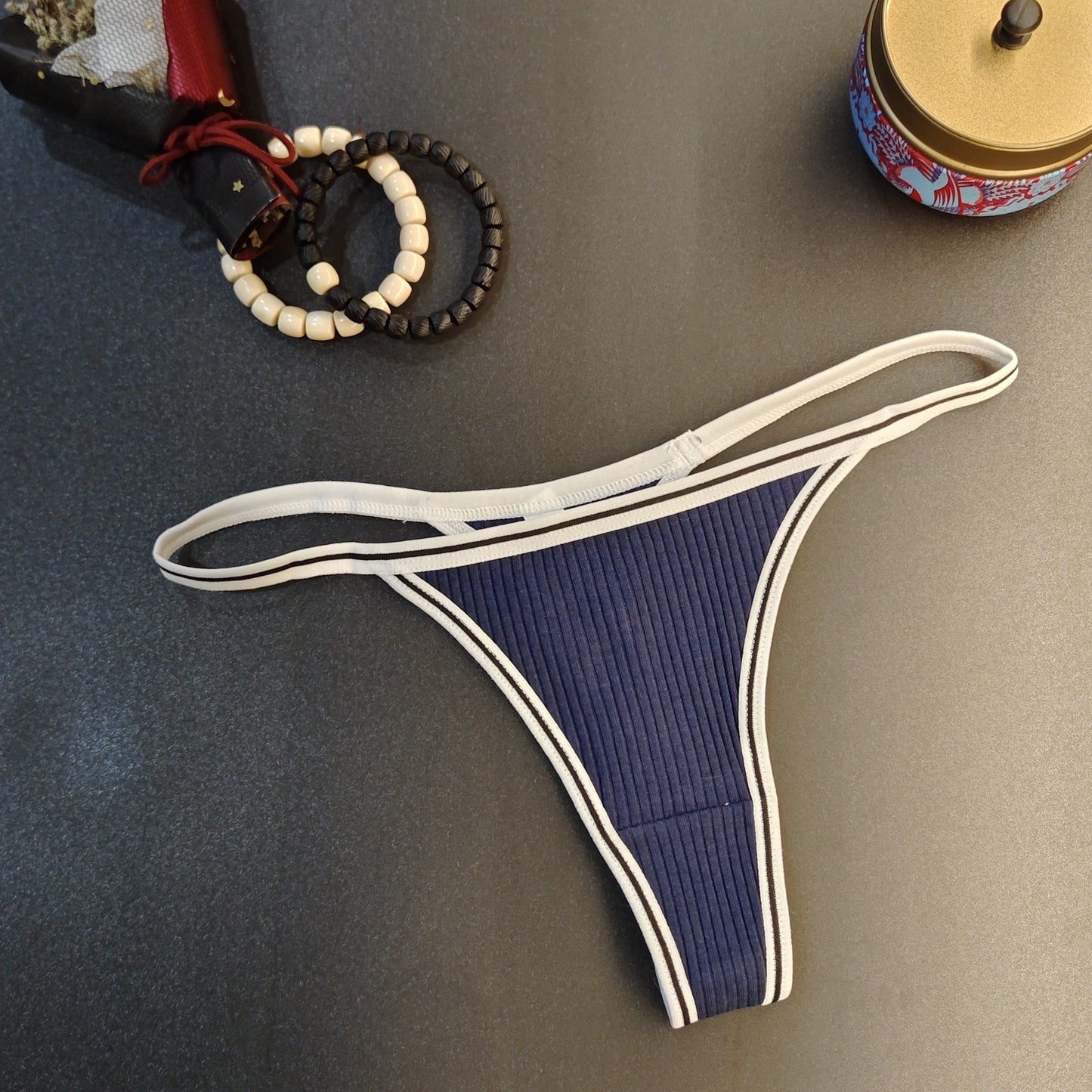 Women's low waist thongs with colorblock stripe print, perfect for sexy lingerie.