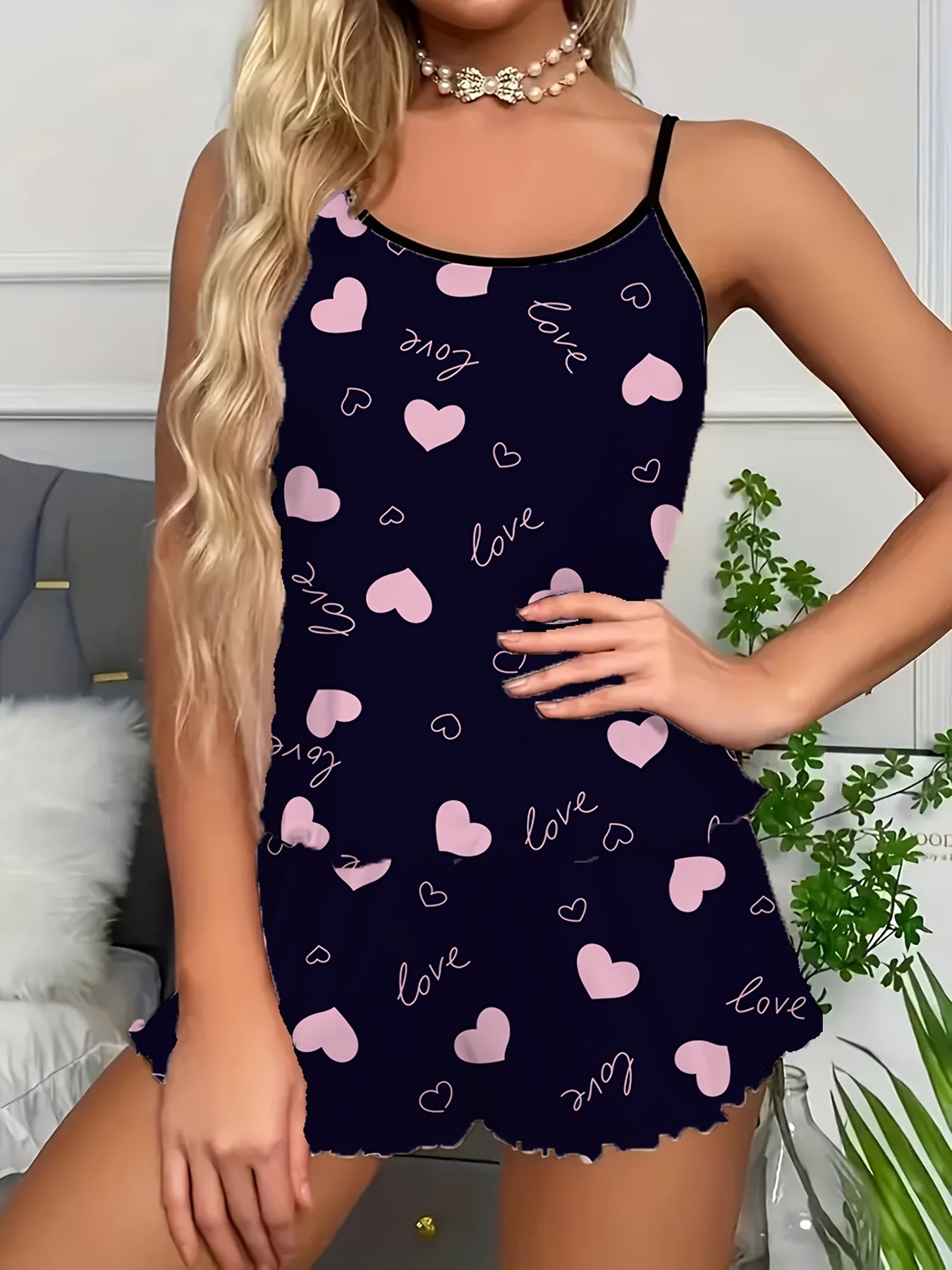 Women's sexy polyester pajama set with love heart print spaghetti strap shorts, perfect for all seasons.