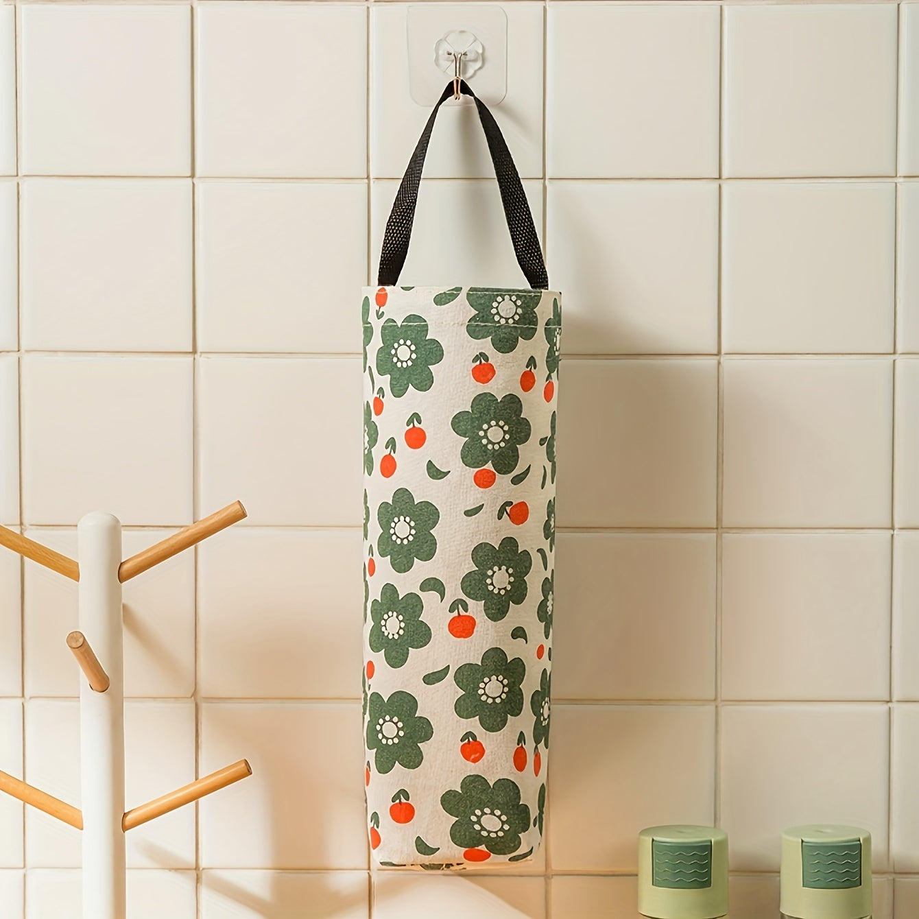 Organize your kitchen with our wall-mounted garbage bag holder - the perfect space-saving solution for keeping plastic bags and other items tidy and accessible.