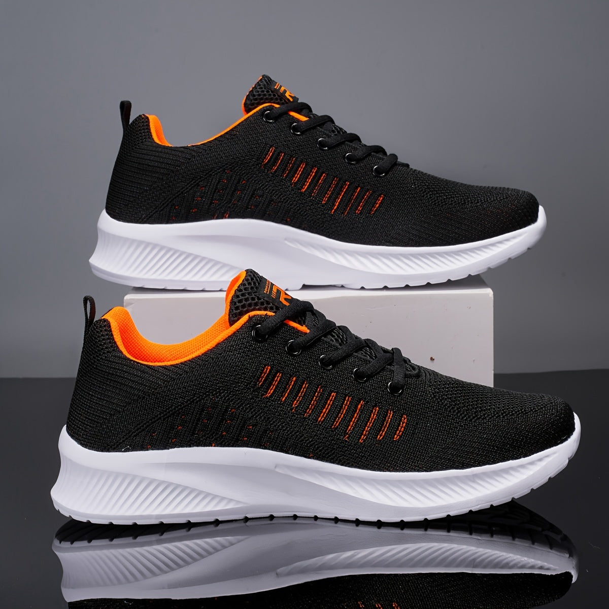 Men's lightweight and breathable lace-up sports shoes for road running, fitness, and casual wear.