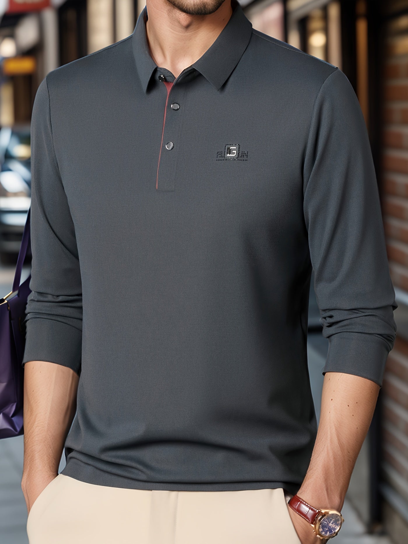 Men's golf polo shirt with letter print collar, perfect for both business casual and outdoor activities.