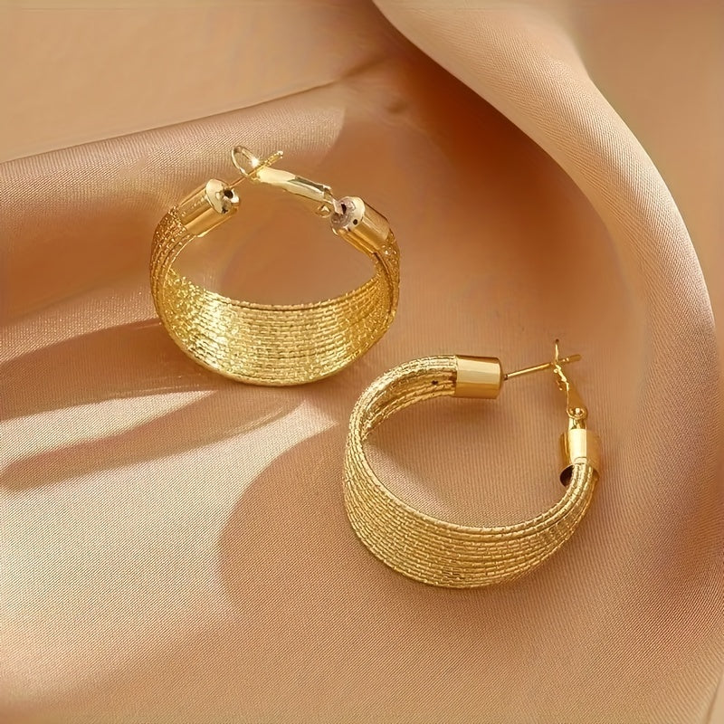 Elegant multi-layer geometric alloy hoop earrings with golden clasp. Perfect for daily wear and special events, suitable as a gift for friends. Geometric design complemented by a fabric