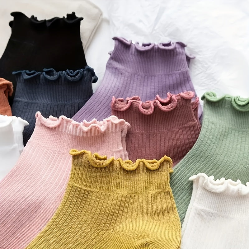 10 pairs of cute, comfortable women's ankle socks made from 95% polyester and 5% elastane. Solid color knit fabric that is machine washable.