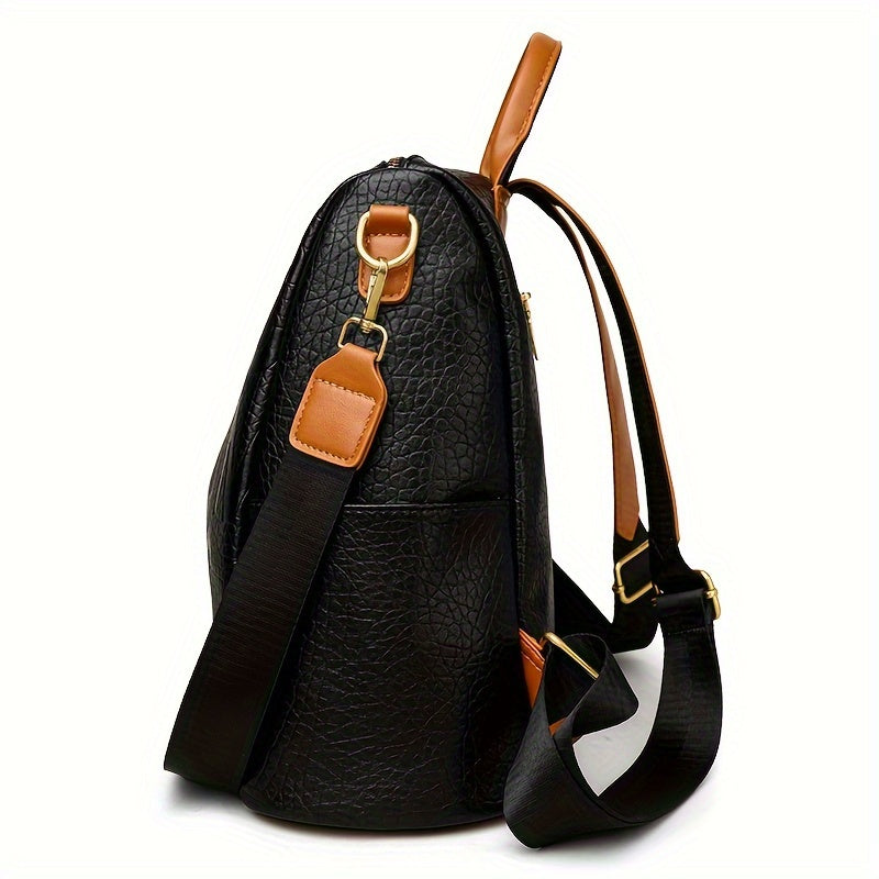 Black women's backpack with large capacity, adjustable straps, crocodile texture, and foldable design - ideal for commuting or travel.