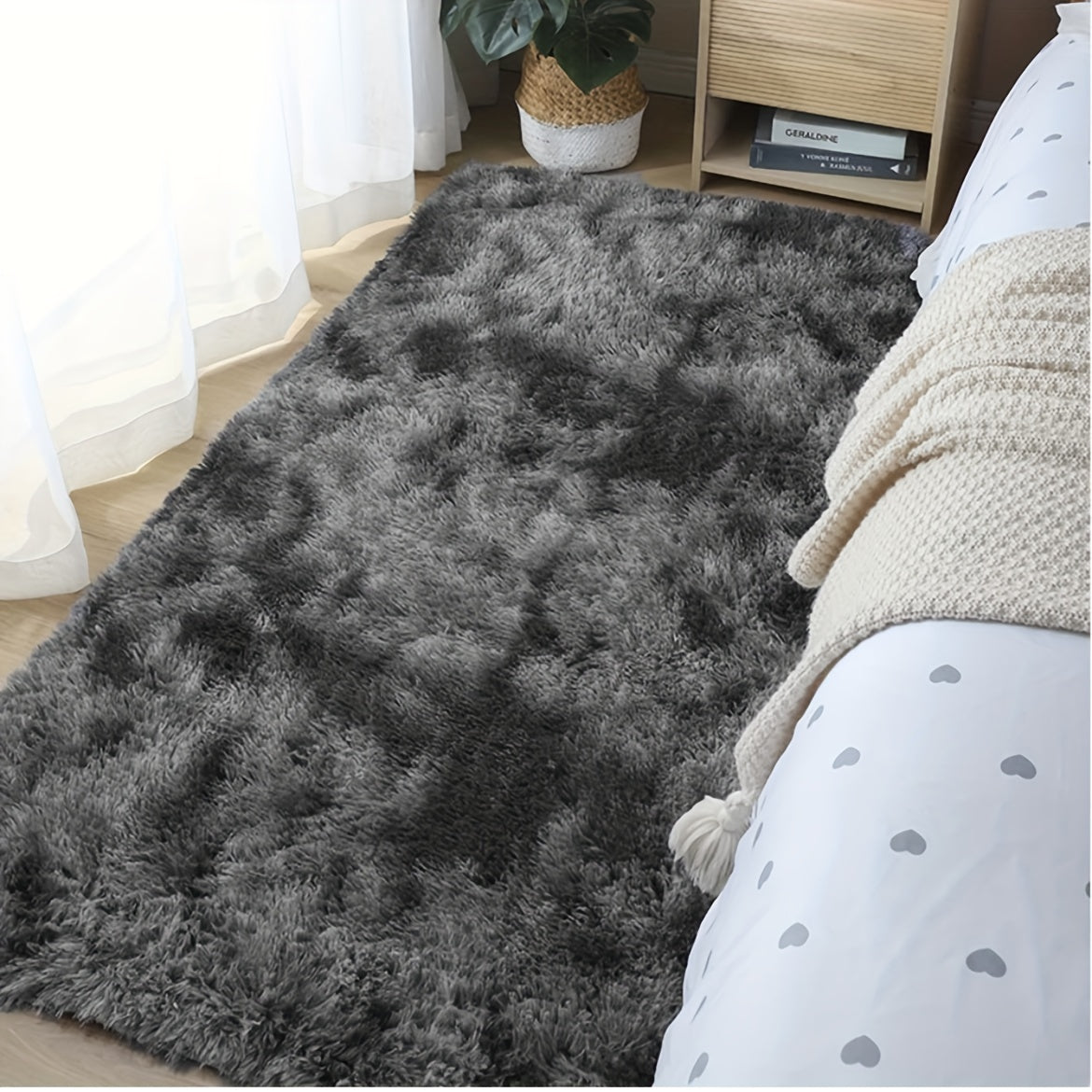 Soft plush area rug, perfect for any room in your home! This non-slip fuzzy shag rug is ideal for adding a touch of luxury to your bedroom or living room. The tie-dyed design adds a unique and stylish touch to your decor. Made with pet-friendly