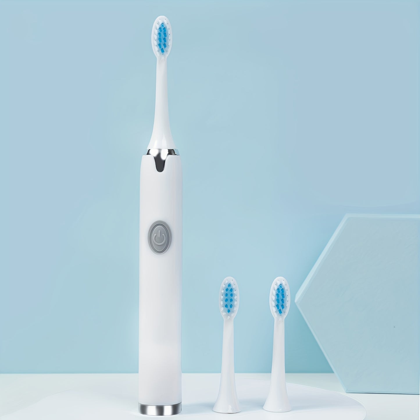 Set includes a battery-powered travel toothbrush, portable toothbrush, and 3 brush heads. Batteries not included.