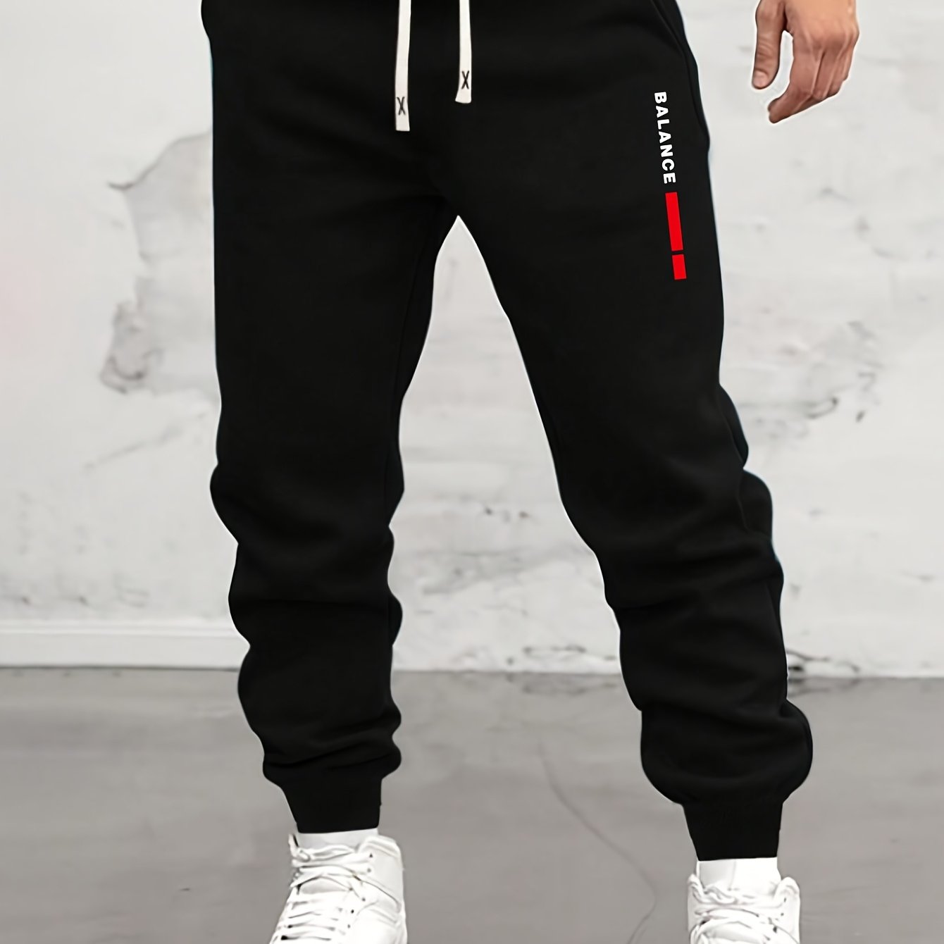 Casual men's sweatpants with letter print, made of polyester knit fabric with stretch. Regular fit with drawstring waist, comfortable for fall/winter.