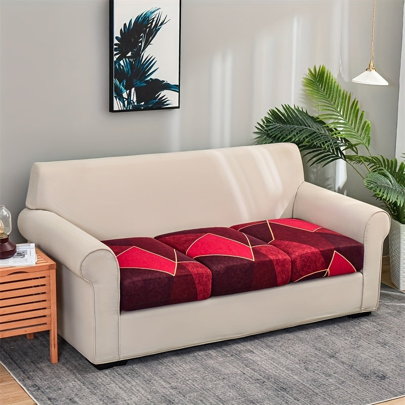 Stretch sofa slipcover with geometric red and blue print, elastic band for easy fit, machine washable, modern home decor accessory for 1 to 4-seater sofas. Made of soft silky fiber fabric with spandex polyester blend for furniture enhancement.