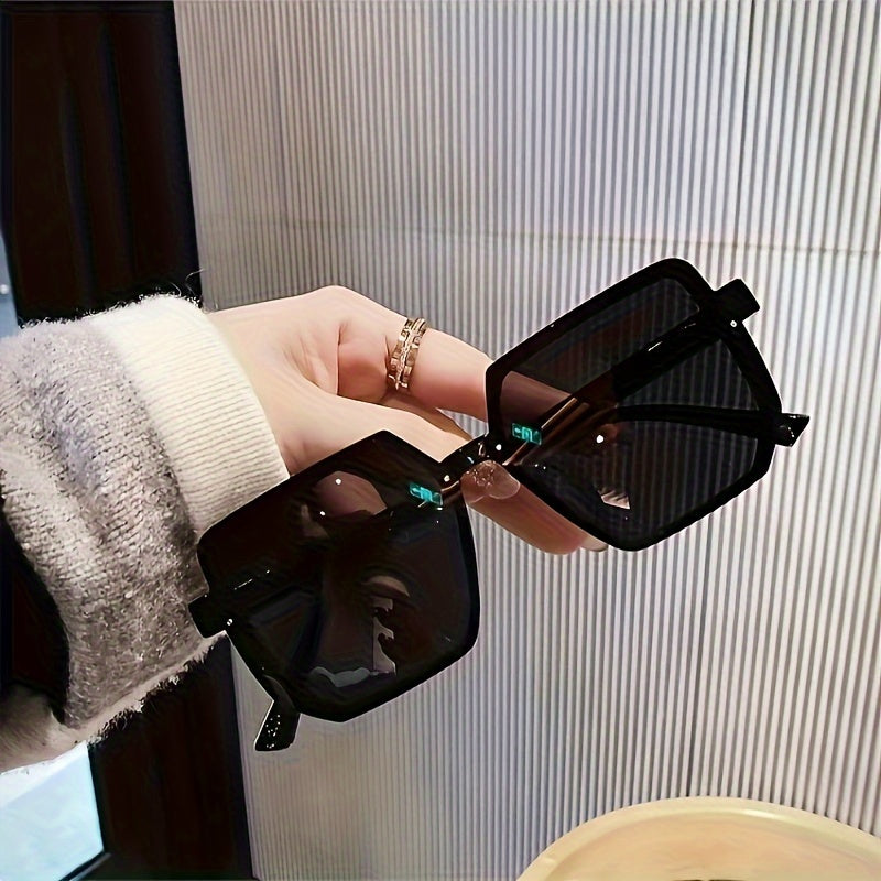 Trendy oversized square frame glasses for women, ideal for driving.