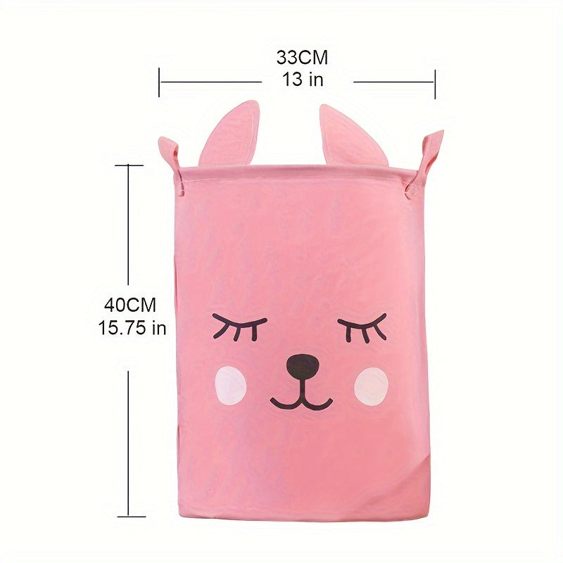 Waterproof fabric toy storage bin with cute cartoon design for kids' toys organization.