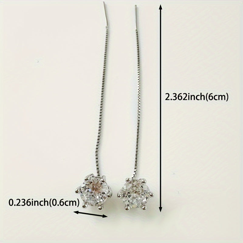 These fashionable dangling earrings for women are set with synthetic cubic zirconia and feature a dangling ear thread design. Made from 2g of S925 silver, these earrings are suitable for all seasons, holidays, and everyday wear. They are also low