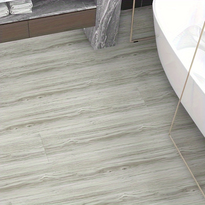 Self-adhesive floor tile sticker with durable faux wood grain design - perfect for enhancing the decor of your office or bedroom. This waterproof and non-slip sticker is designed to last.