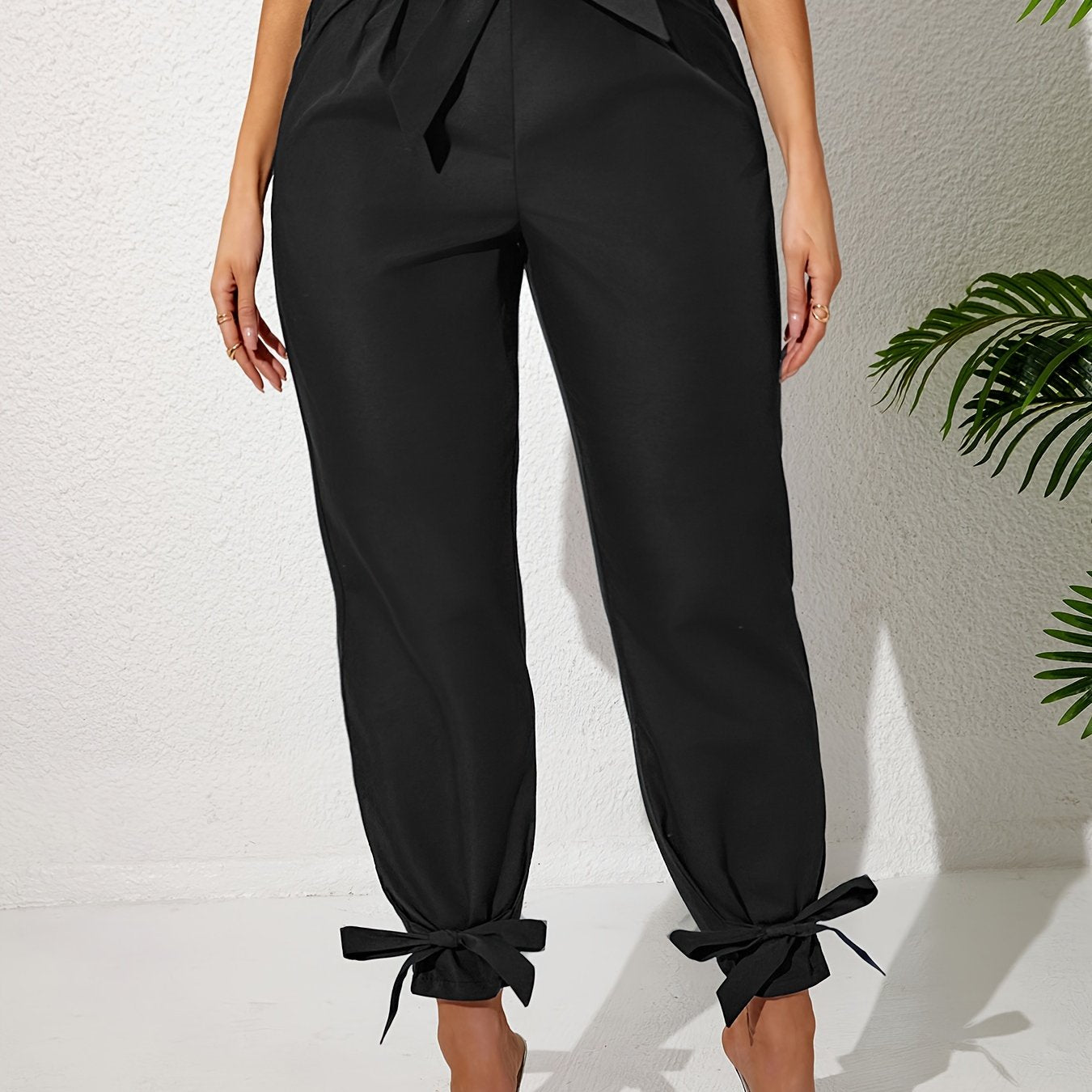 Solid straight leg pants with elastic drawstring waist and elegant bow detail. Perfect for spring and summer in plus size.