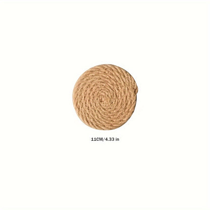 Hand-woven Japanese-style jute placemat for dining table, featuring insulation and serving as a bowl, pot holder, and cup coaster.