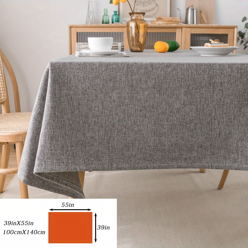 Modern grey polyester tablecloth, waterproof and thickened, machine woven, 100% polyester, for a rectangular dining table.