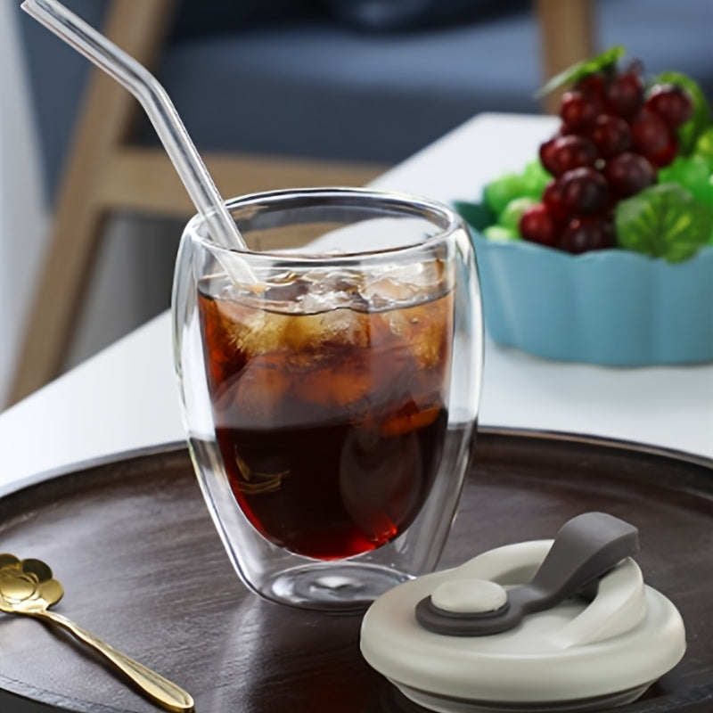 Insulated espresso cup with double layer clear glass, silicone lid, egg-shaped design for easy grip and comfortable drinking. Ideal for coffee, juice, and milk.