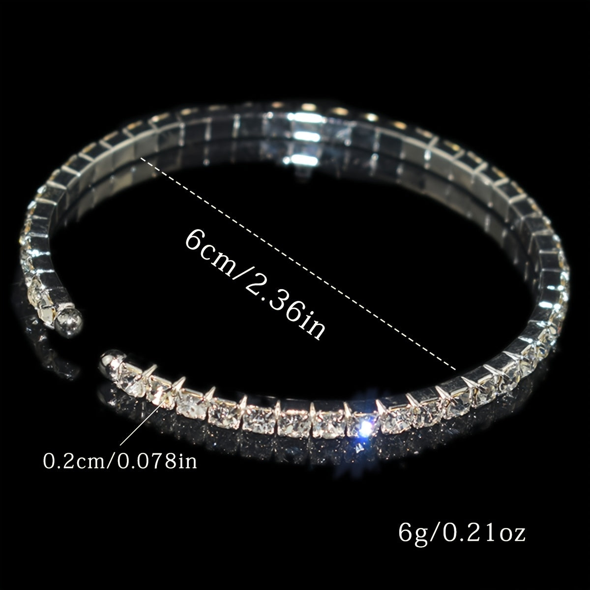 Elegant silvery-plated bracelet with cubic zirconia in classic single row design for weddings and everyday glam.