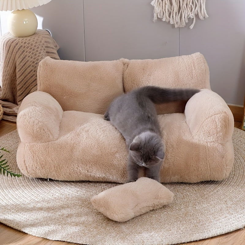 Soft beige plush cat bed with non-slip base, detachable cover, and polyester fill. Ideal for snoozing and relaxing, easy to clean. Perfect for kittens and cats.