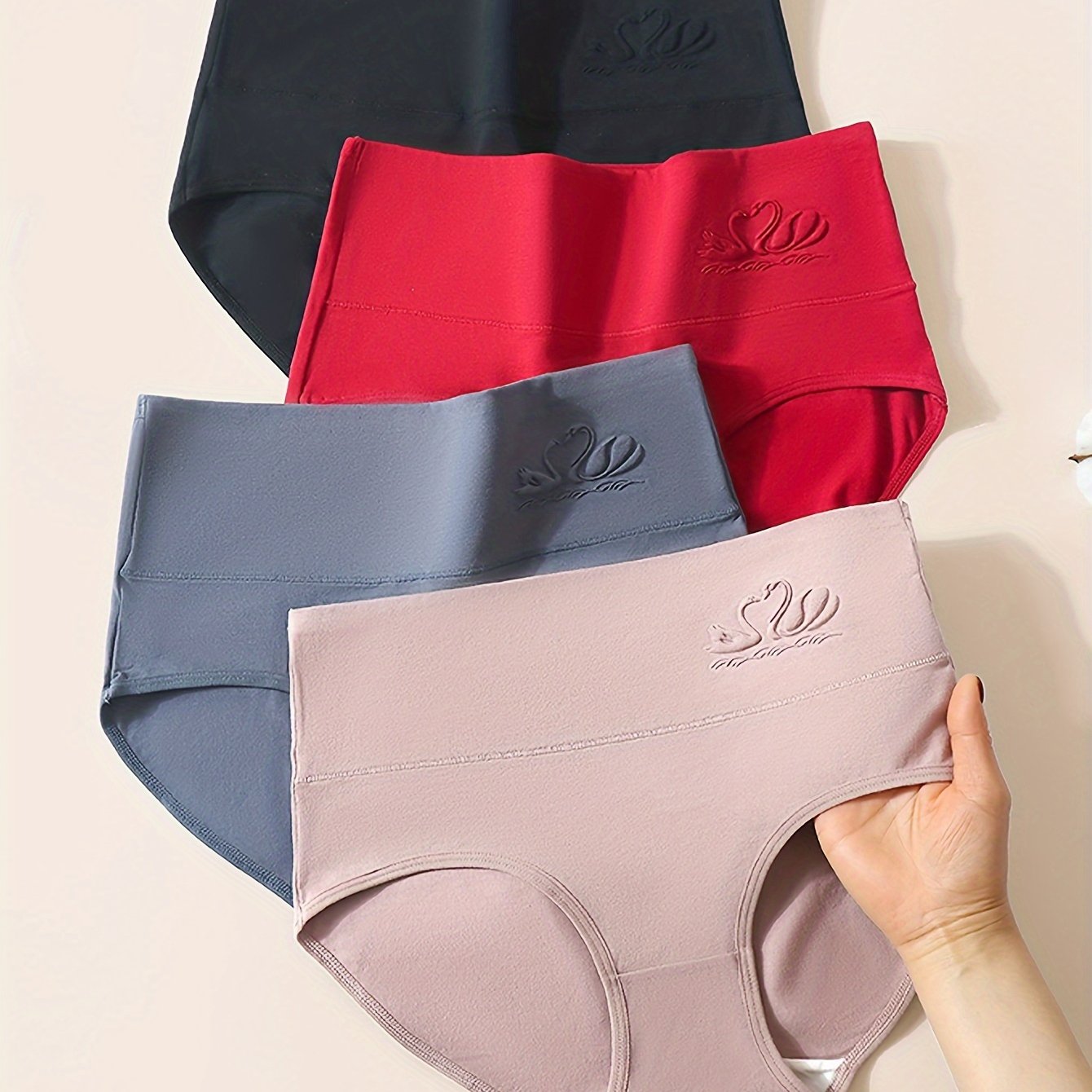 Four seamless high waist briefs with a simple and comfortable design, made from stretchy and breathable fabric, suitable for women's lingerie and underwear.