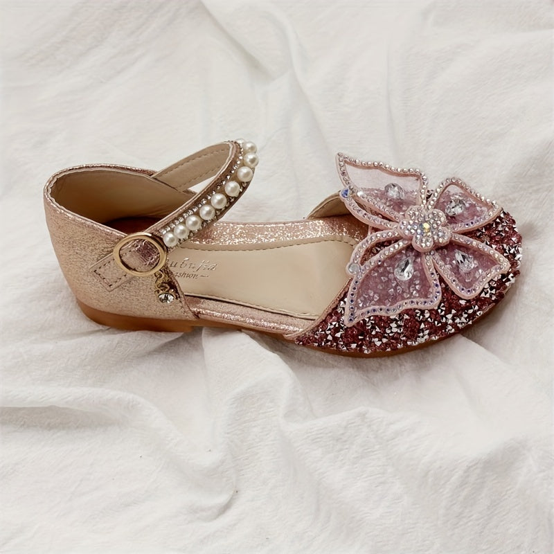 Girls' sandals with fake pearl and sequin embellishments.