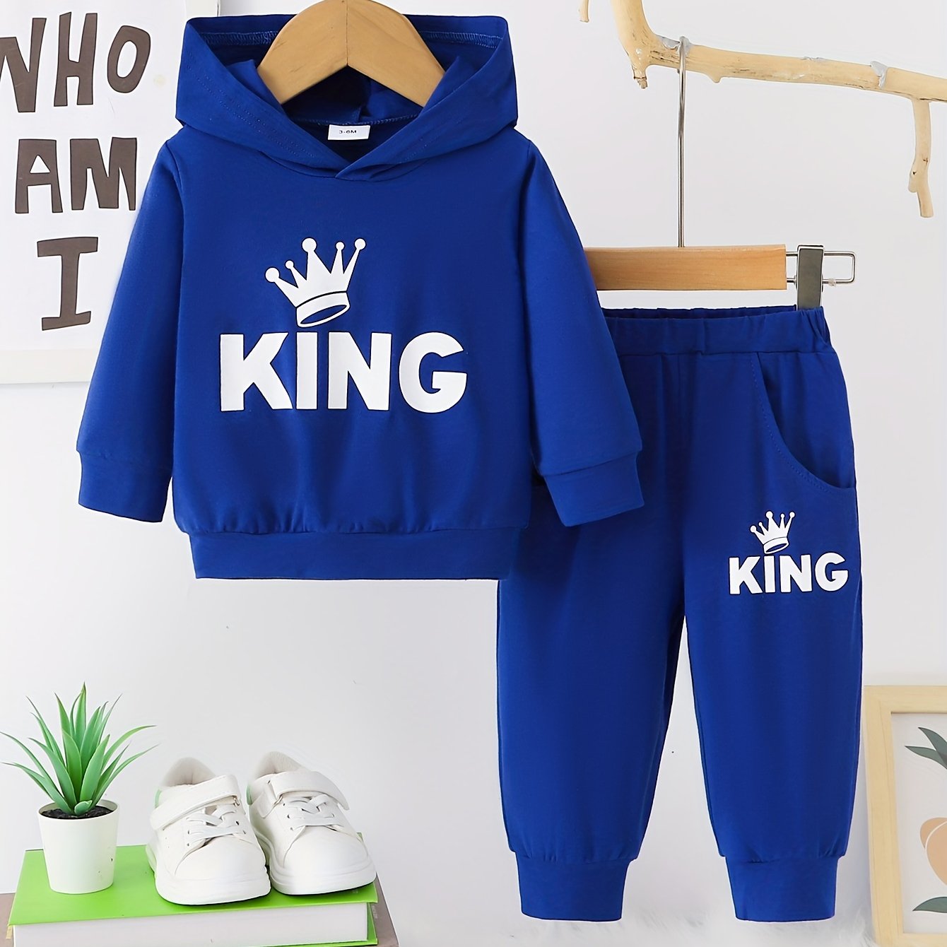 Baby boy's casual outfit set with hooded sweatshirt featuring KING print and matching pants.