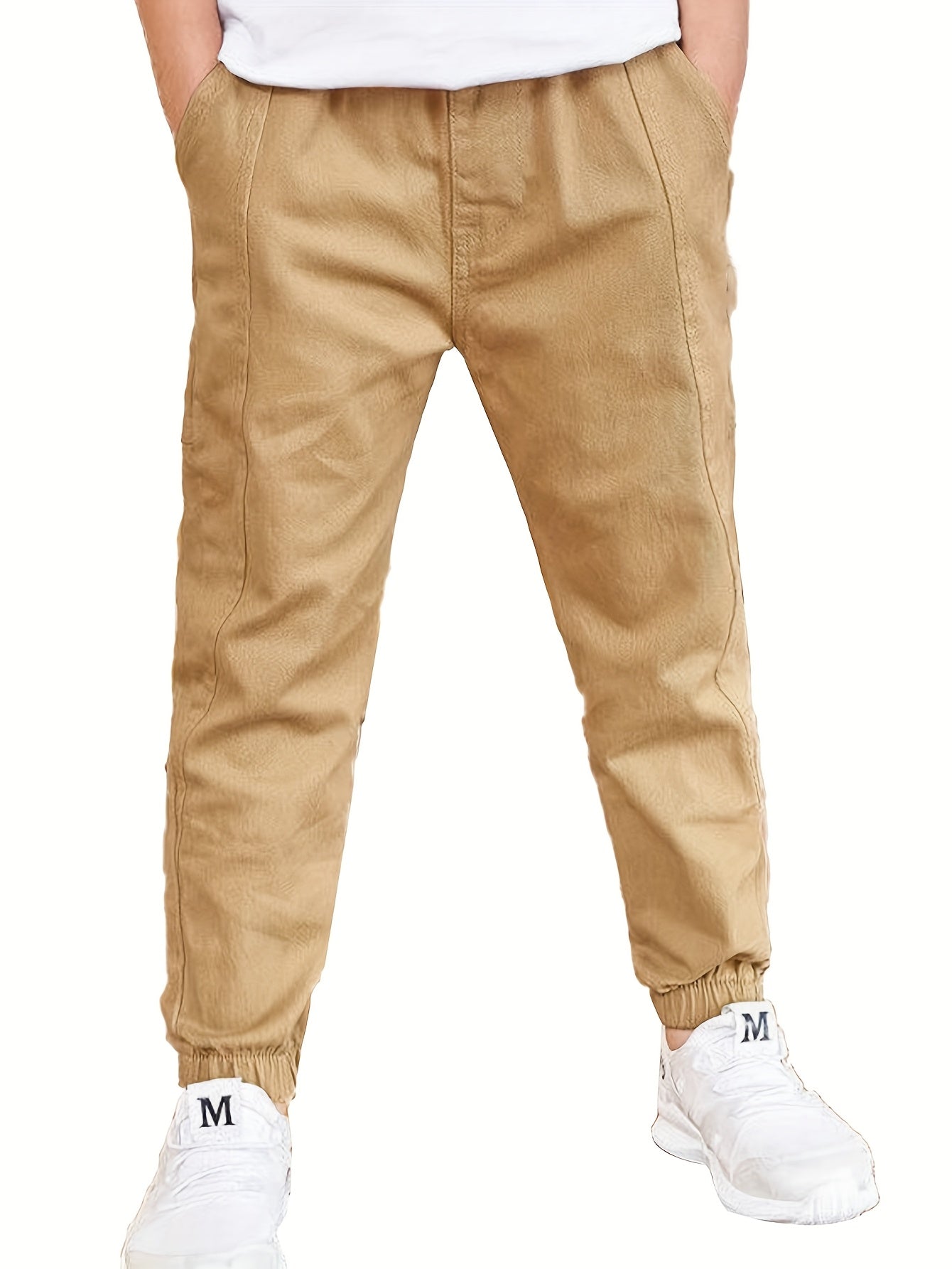 Boys' cotton cargo pants with elastic waist and pockets, ideal for casual and outdoor activities.