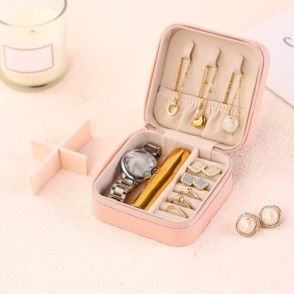 Travel-friendly jewelry organizer for rings, necklaces, and earrings.