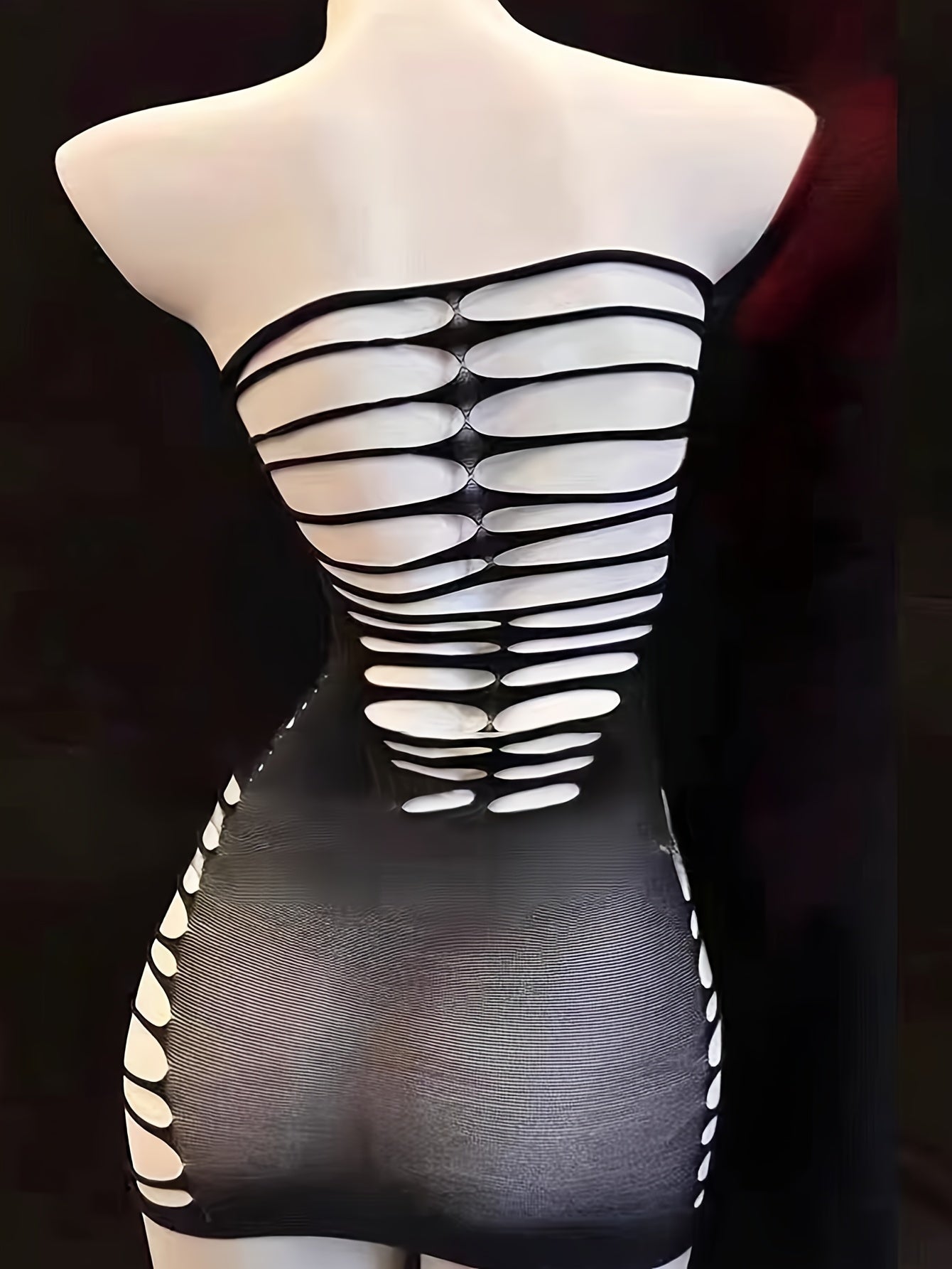 Sexy women's dress without undergarments by Hollow Fashion Design.