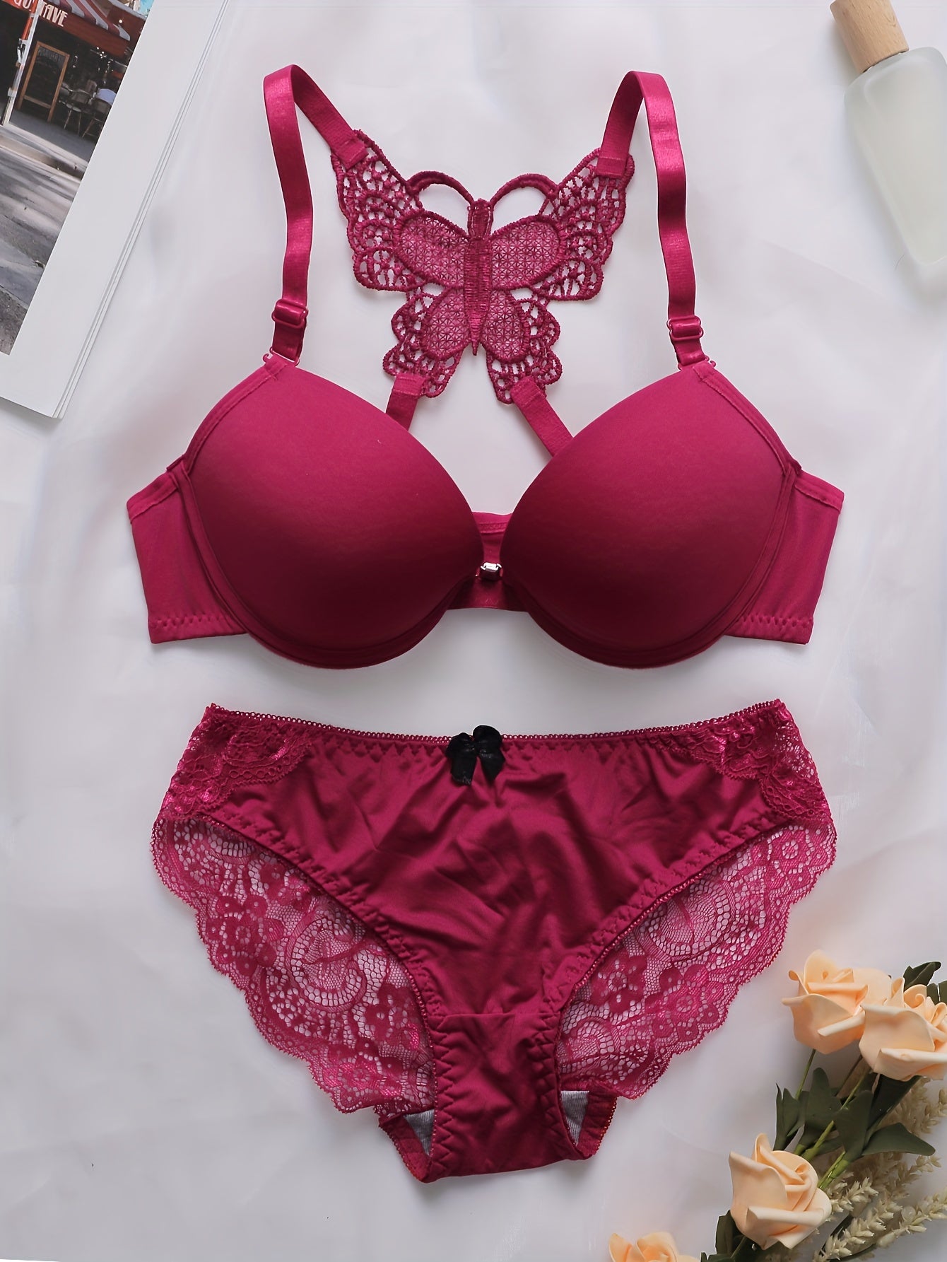 Lacy lingerie set with front buckle bra and scallop trim panties.