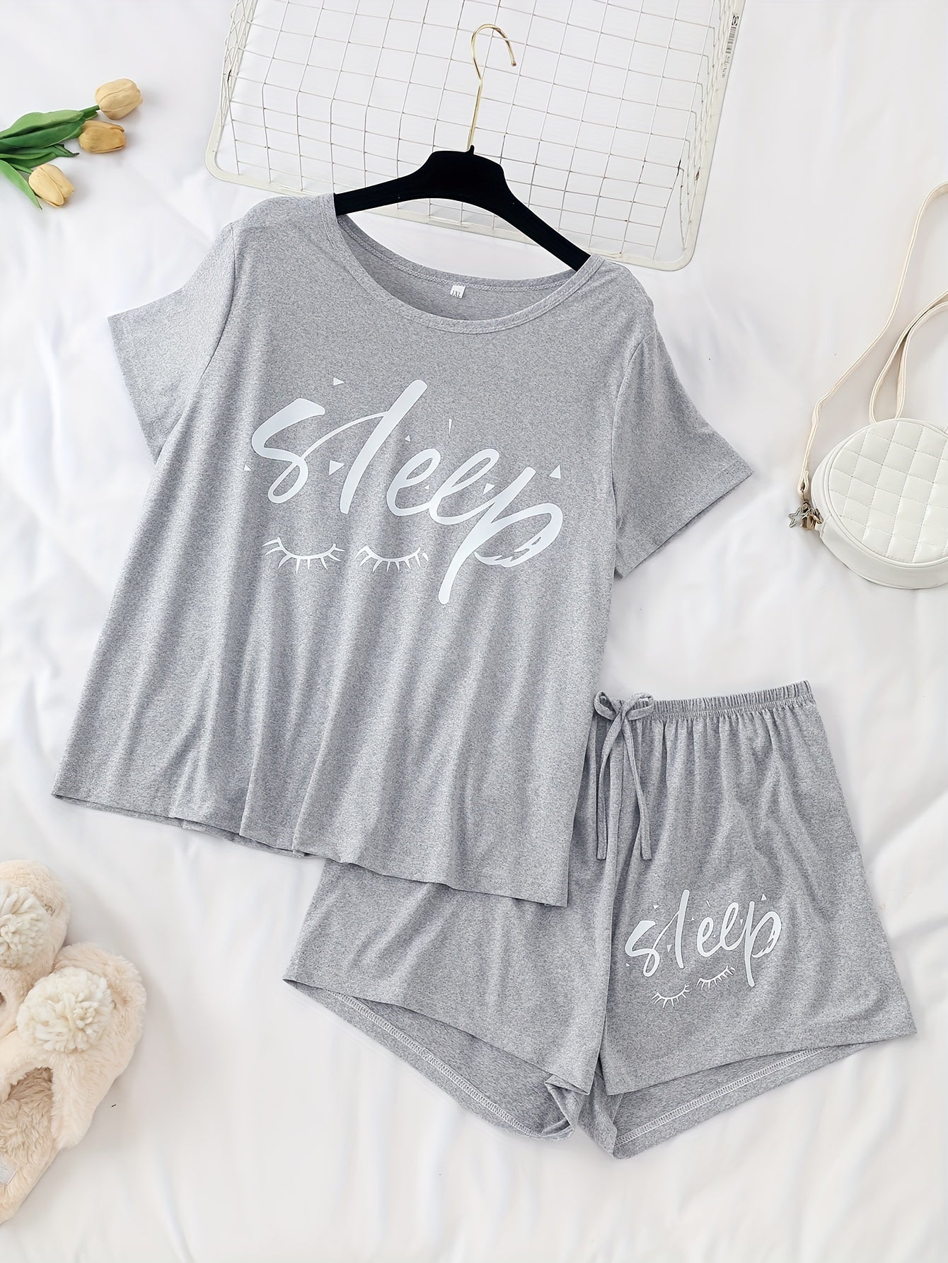 Women's 3-piece pajama set featuring alphabet print, polyester knit fabric with stretch, color block short sleeve top and shorts. Perfect for fall season lounging at home.