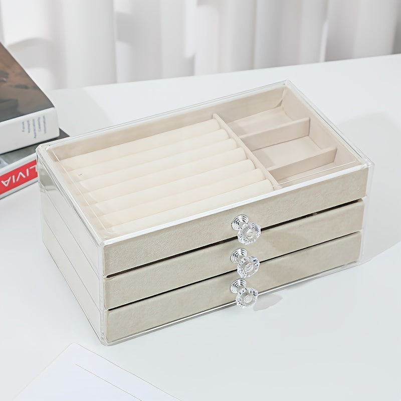 Transparent three-layer portable jewelry storage box with large capacity and dustproof drawers. Perfect for storing earrings, necklaces, and other jewelry. Ideal gift for Valentine's Day, Christmas, or any special occasion.