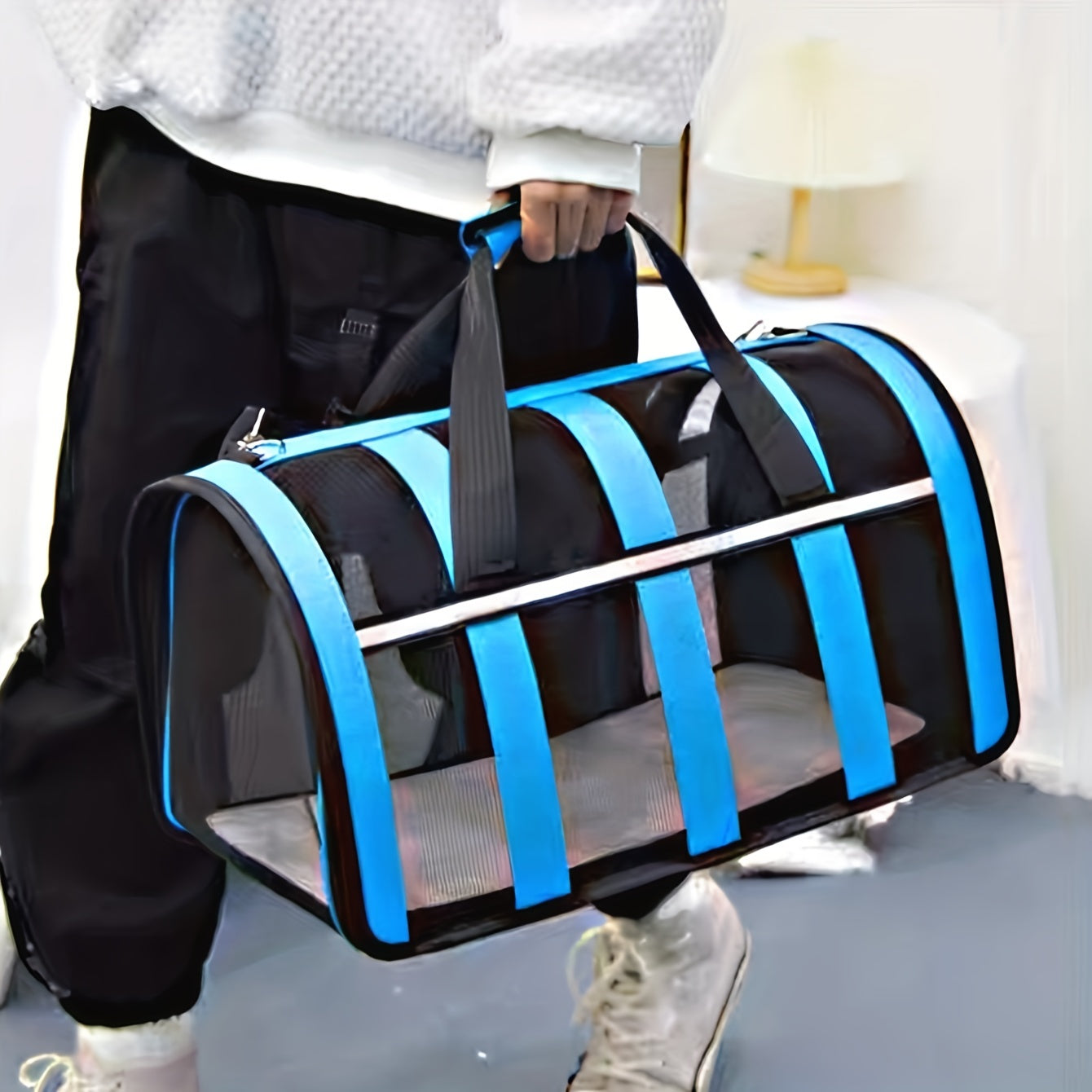 Portable pet carrier bag with locking safety zippers, airline approved.