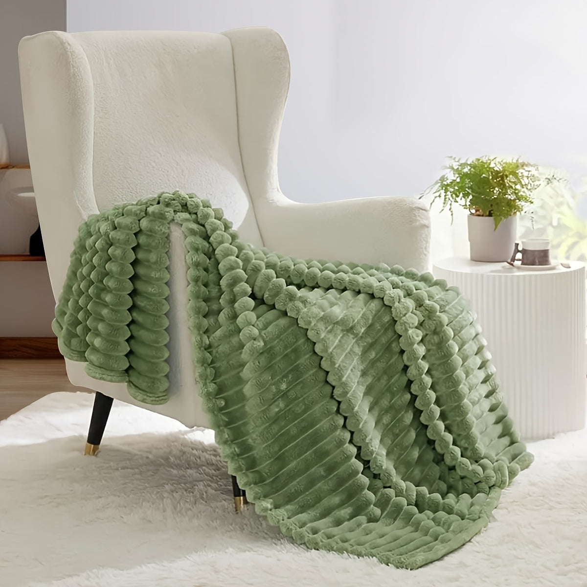 Upgrade your comfort with this dual-sided striped fleece throw blanket. The ribbed texture adds a touch of luxury, while the cozy and warm material makes it perfect for any season. Whether you use it for naps, in the office, or in the bedroom, this