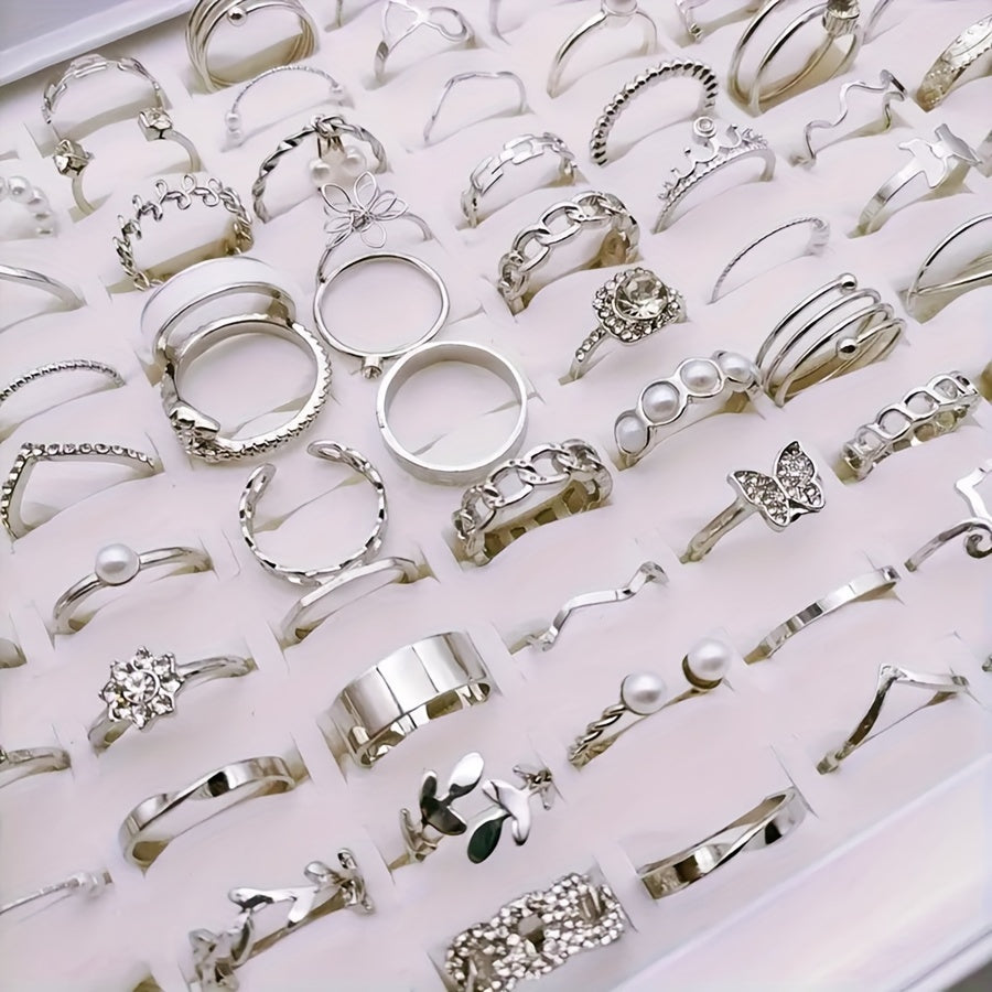 Pack of 30 simple butterfly love alloy rings for women, featuring an elegant and versatile mixed style. Perfect for party, wedding, or daily wear. Each set includes multiple pieces. Rings will be randomly shipped in OPP bag packaging.