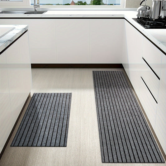 One piece of rectangular kitchen carpet measuring 1.8m x 0.9m. Features include non-slip, oil resistant, waterproof, and easy to maintain polyester fiber material with low pile. The carpet is machine washable and has a striped pattern, making it a