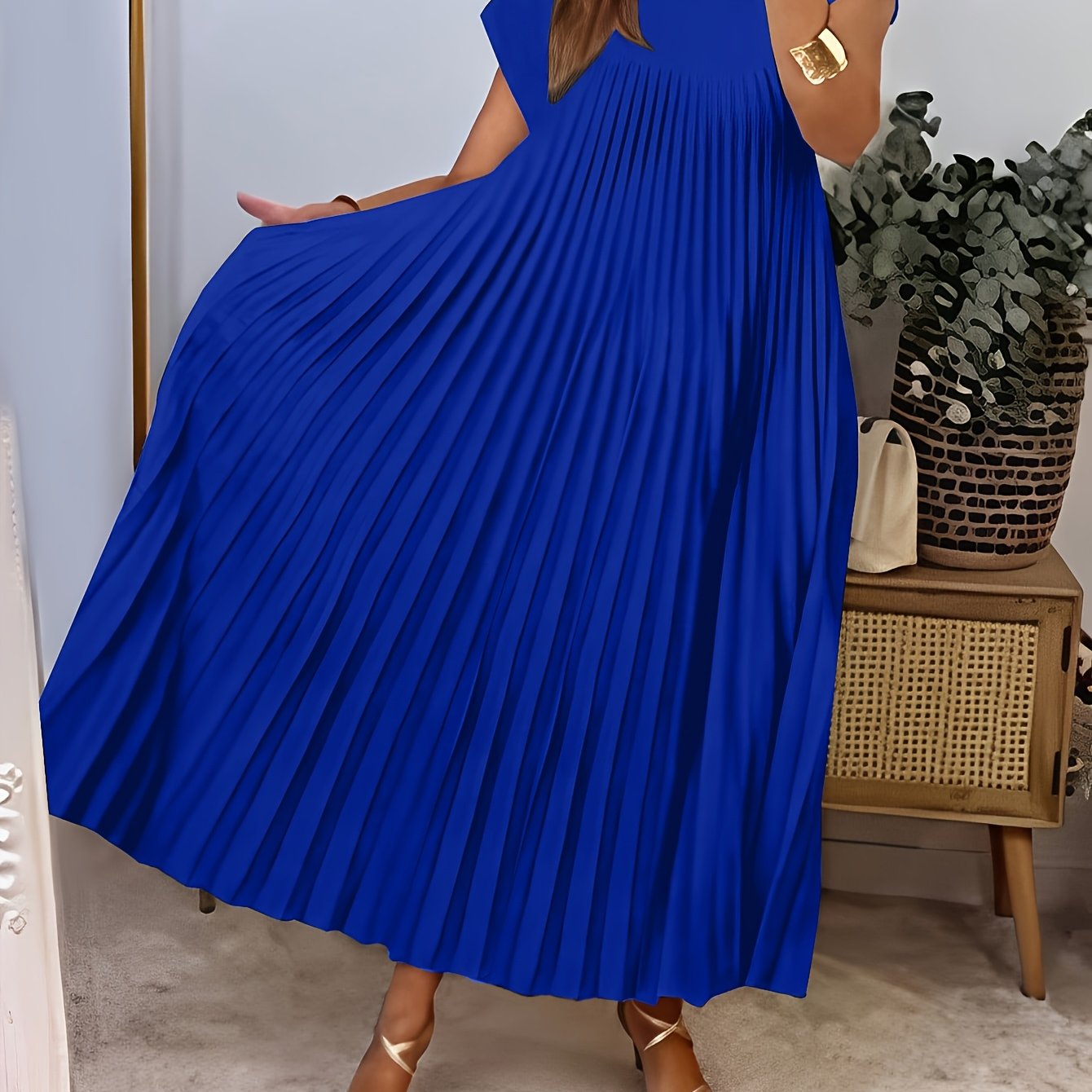 Women's solid blue pleated A-line tunic dress with crew neck, short sleeves, and flared hem, made of non-stretch polyester. Loose silhouette perfect for vacation style. From the