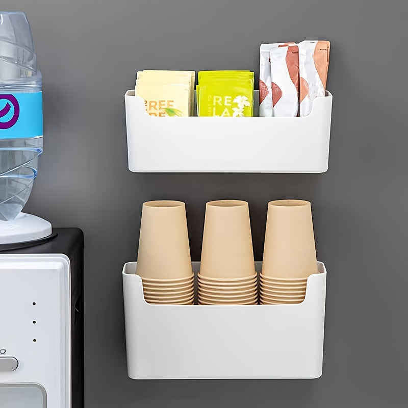 Get your hands on the 1-piece Kitchen Storage Box that can neatly store disposable paper cups, plastic wrap, seasonings, and more. This box comes equipped with 3 sheets of sturdy double-sided film and can be mounted on the wall without the need for