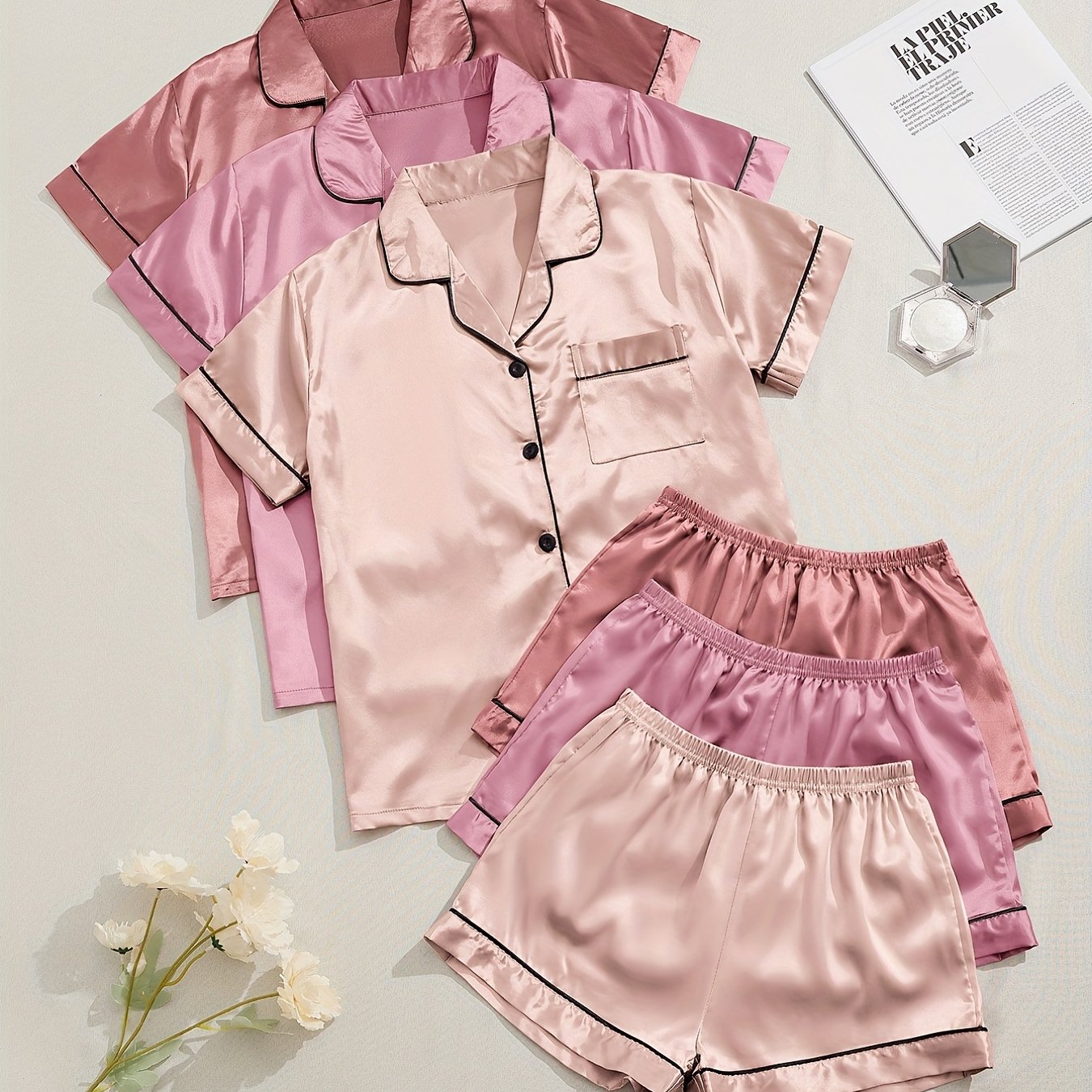 Women's two-piece pajama set in multicolor variety of short-sleeved shorts and solid color imitation satin.