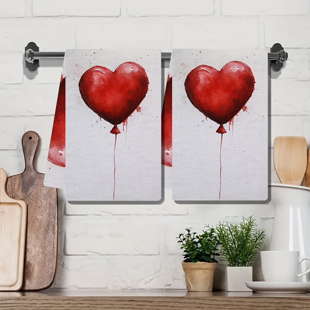 Two pieces of ultra soft kitchen towels featuring a Valentine's heart balloon design. These highly absorbent and machine washable dish hand towels are contemporary red on white decor and measure 40.64x60.96 cm. A must-have addition to your kitchen!