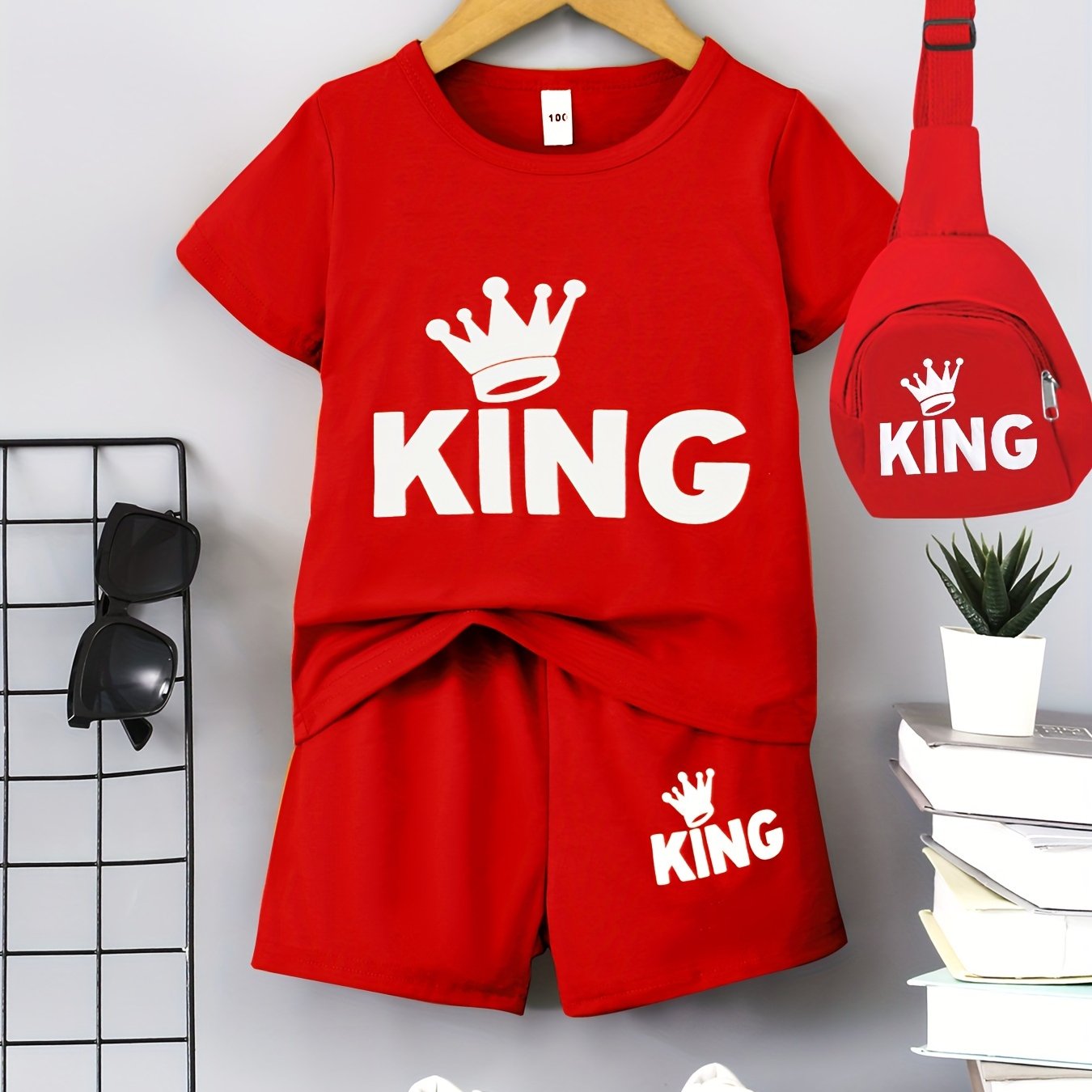 Boys' "KING" Crown Print Casual Outfit Set in Black - includes T-shirt, shorts, and crossbody bag. Made of 100% polyester, machine washable. Ideal for spring/summer, outdoor activities.